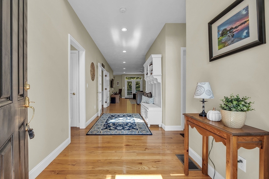 124 Nicholas Drive Lancaster, MA 01523 - Photo 12 of 42 a view of living room and dining room