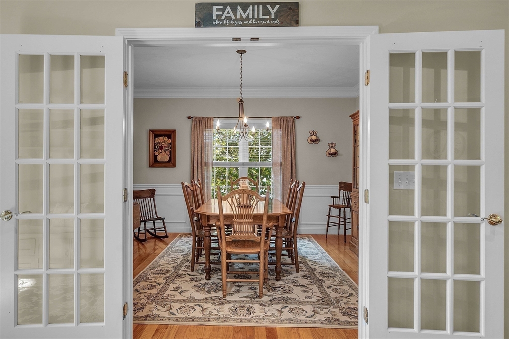 124 Nicholas Drive Lancaster, MA 01523 - Photo 24 of 42 a dining room with furniture window and outside view