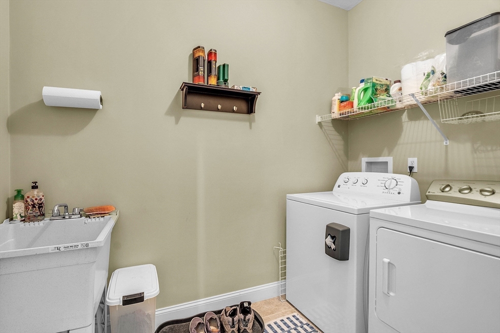 124 Nicholas Drive Lancaster, MA 01523 - Photo 35 of 42 a utility room with dryer and washer