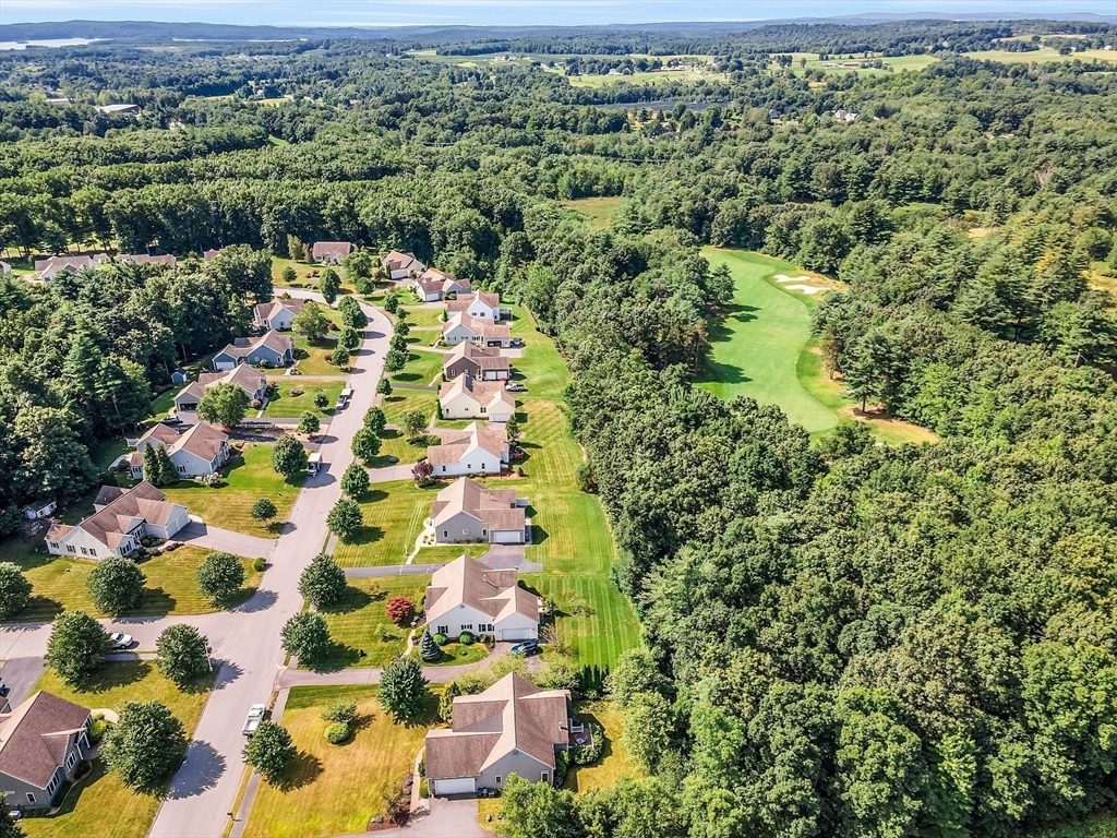 124 Nicholas Drive Lancaster, MA 01523 - Photo 10 of 42 a view of a garden