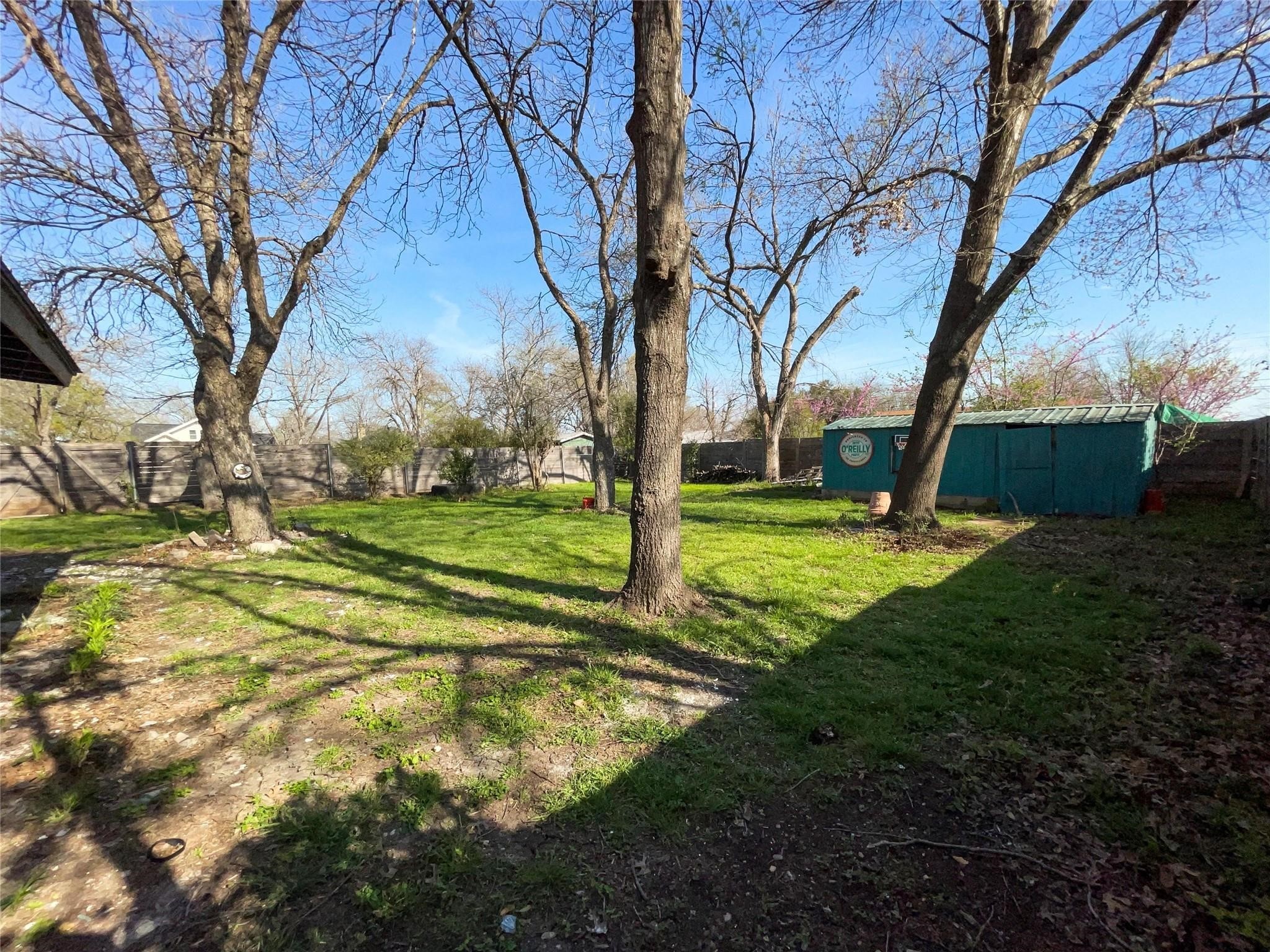204 East 18th Street Georgetown, TX 78626 - Photo 17 of 21 a view of a playground with a large tree