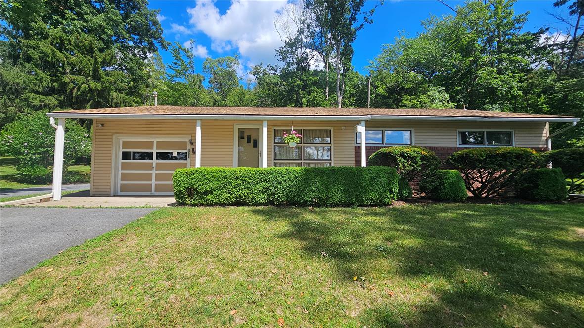 2529 Ringhoffer Road Hellertown, PA 18055 - Photo 2 of 33 A well-maintained facade with neatly trimmed hedges enhances this charming single-story residence.