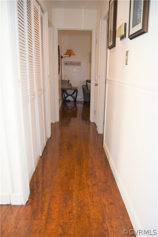 8530 Boones Trail Road Chesterfield, VA 23832 - Photo 11 of 21 a view of a hallway with wooden floor and a living room
