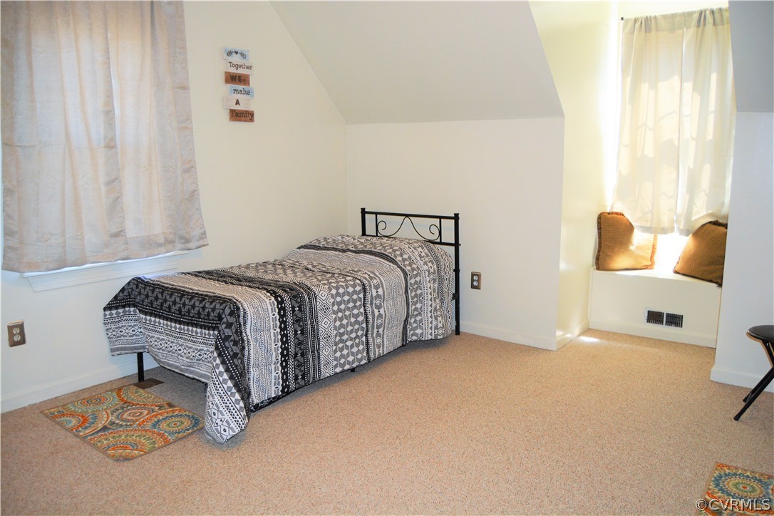 8530 Boones Trail Road Chesterfield, VA 23832 - Photo 15 of 21 a bedroom with a bed and a window