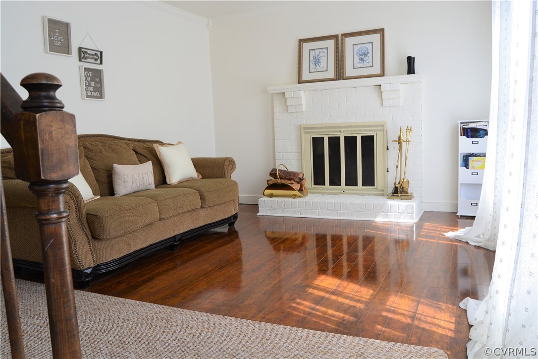 8530 Boones Trail Road Chesterfield, VA 23832 - Photo 3 of 21 a living room with furniture and a fireplace