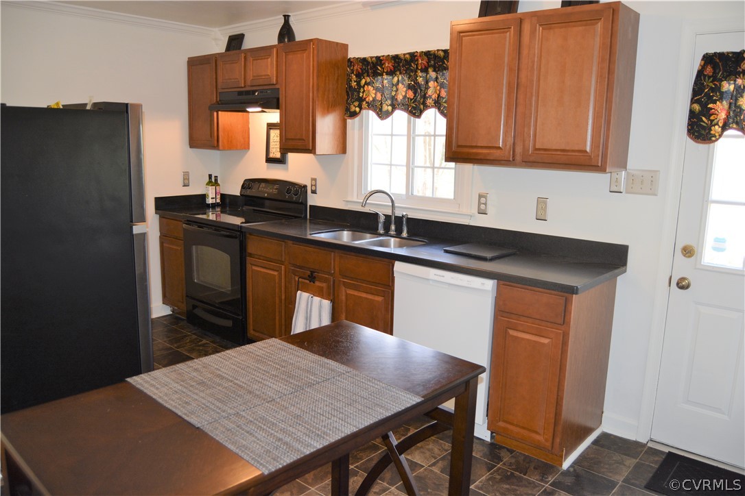 8530 Boones Trail Road Chesterfield, VA 23832 - Photo 8 of 21 a kitchen with granite countertop a sink stove and refrigerator