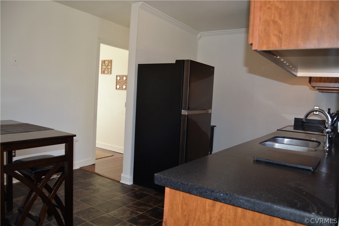 8530 Boones Trail Road Chesterfield, VA 23832 - Photo 10 of 21 a kitchen with a refrigerator and a stove top oven