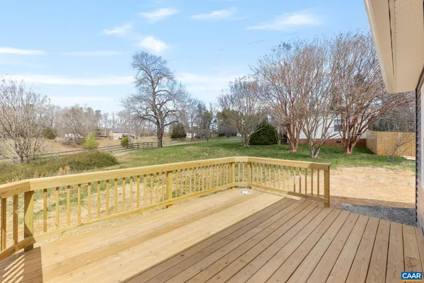 a view of lake with a yard