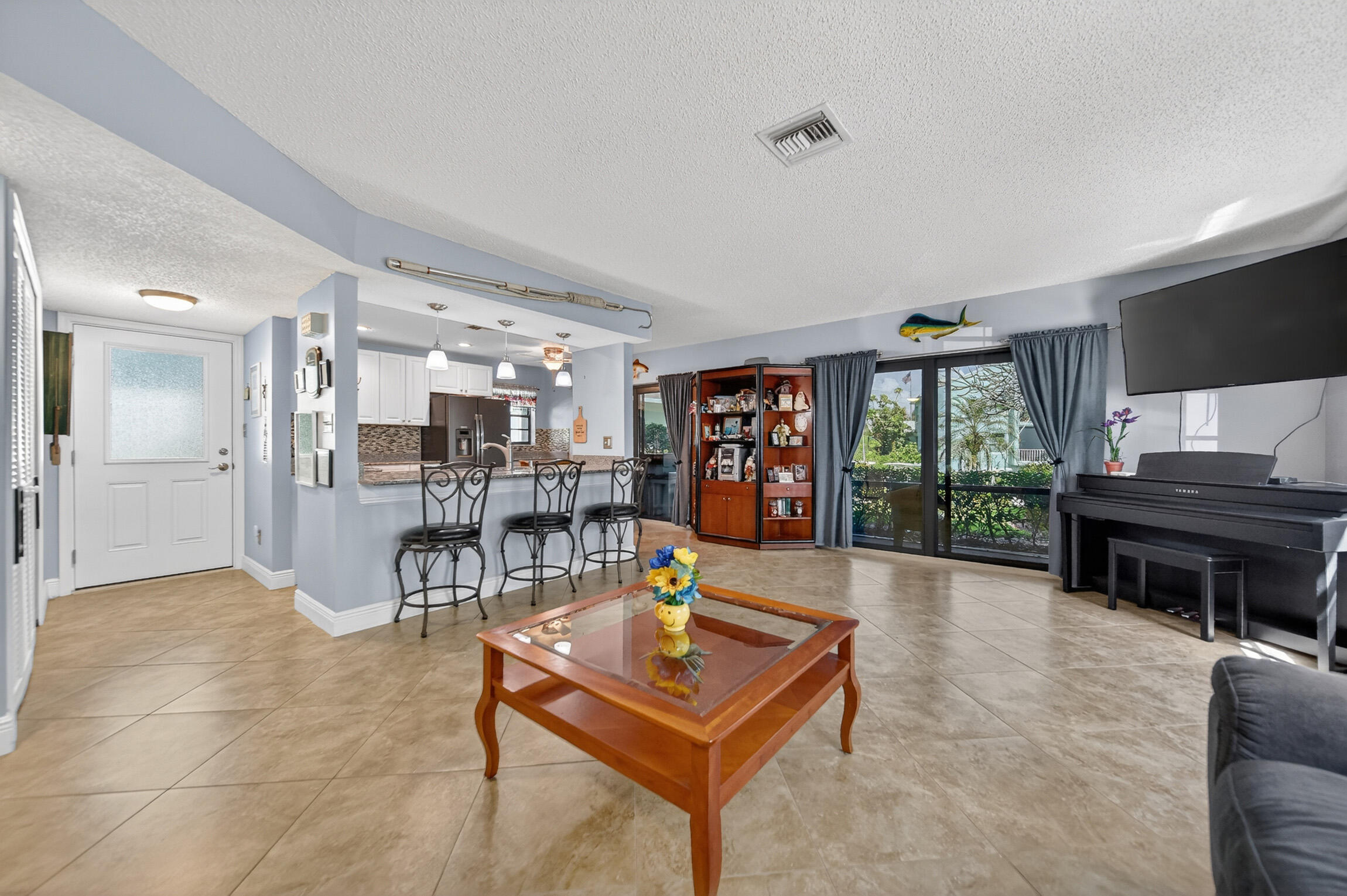 4083 Southeast Centerboard Lane, Unit 3A Stuart, FL 34997 - Photo 9 of 31 livingkitchen1.jpg-FULL