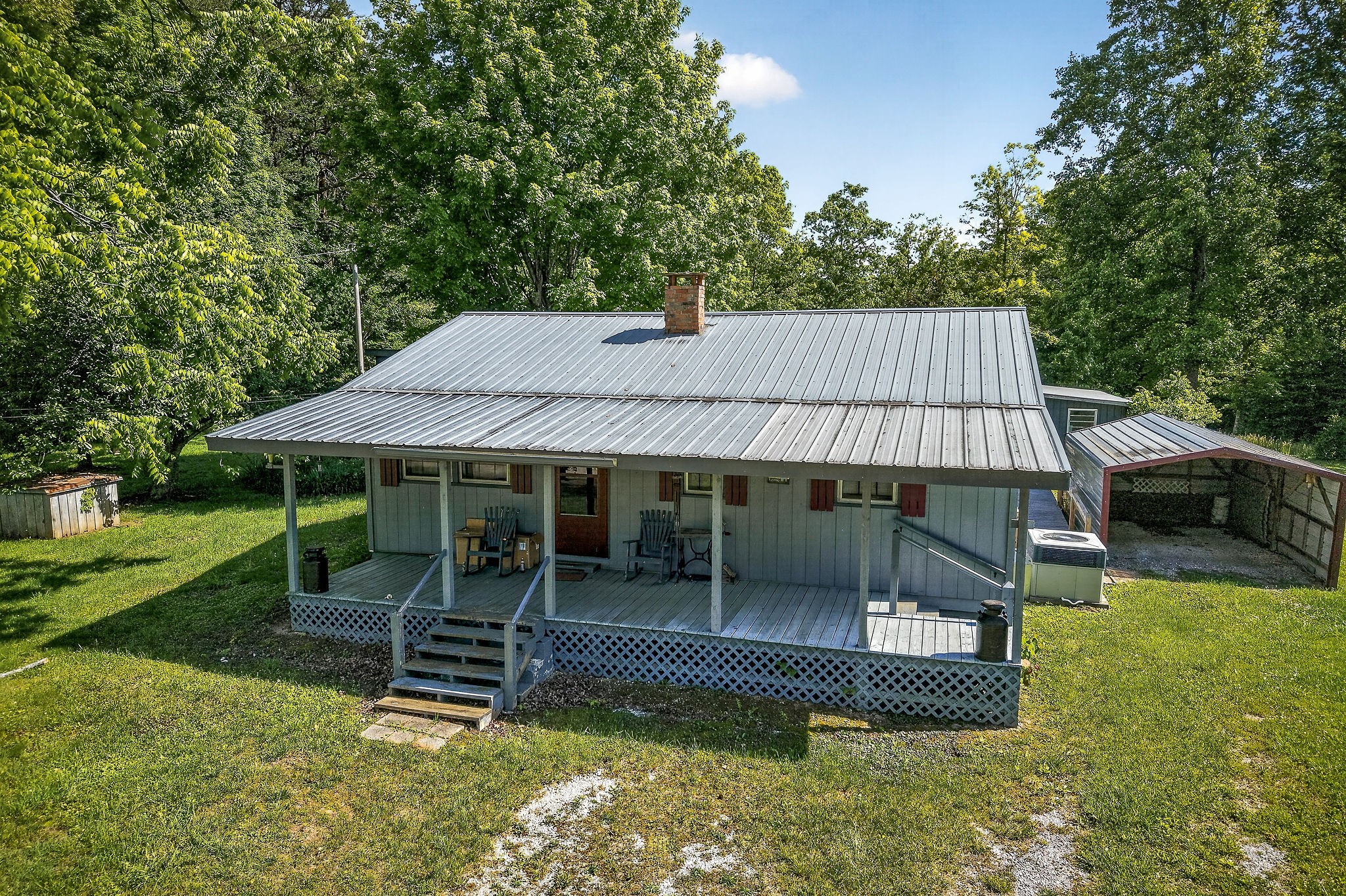 1720 Besstown Road Beersheba Springs, TN 37305 - Photo 1 of 75 an outdoor sitting area with golf course