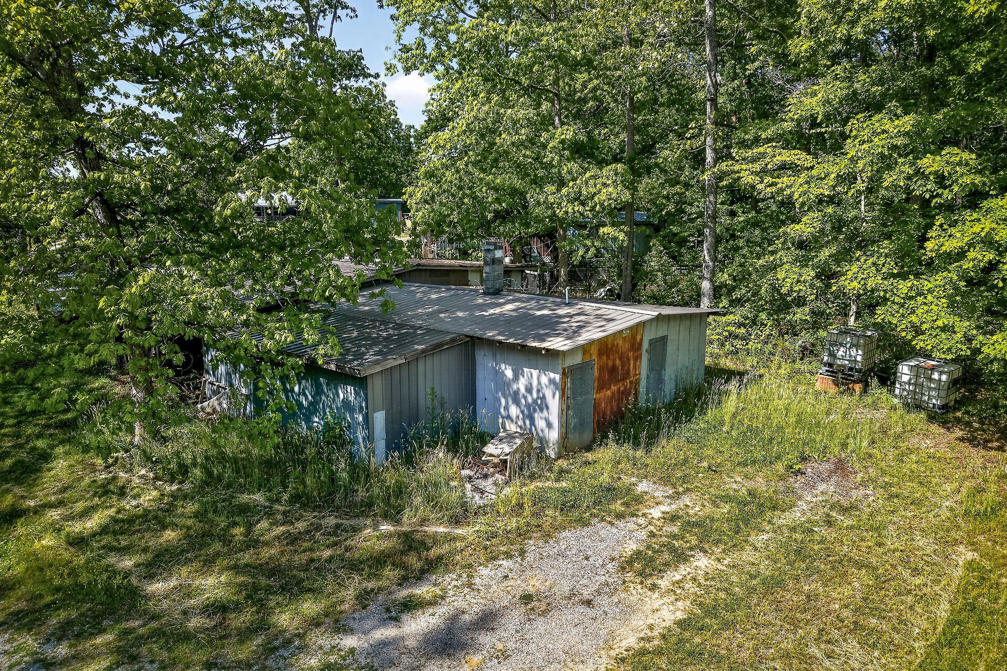 1720 Besstown Road Beersheba Springs, TN 37305 - Photo 11 of 75 a view of a house with a yard