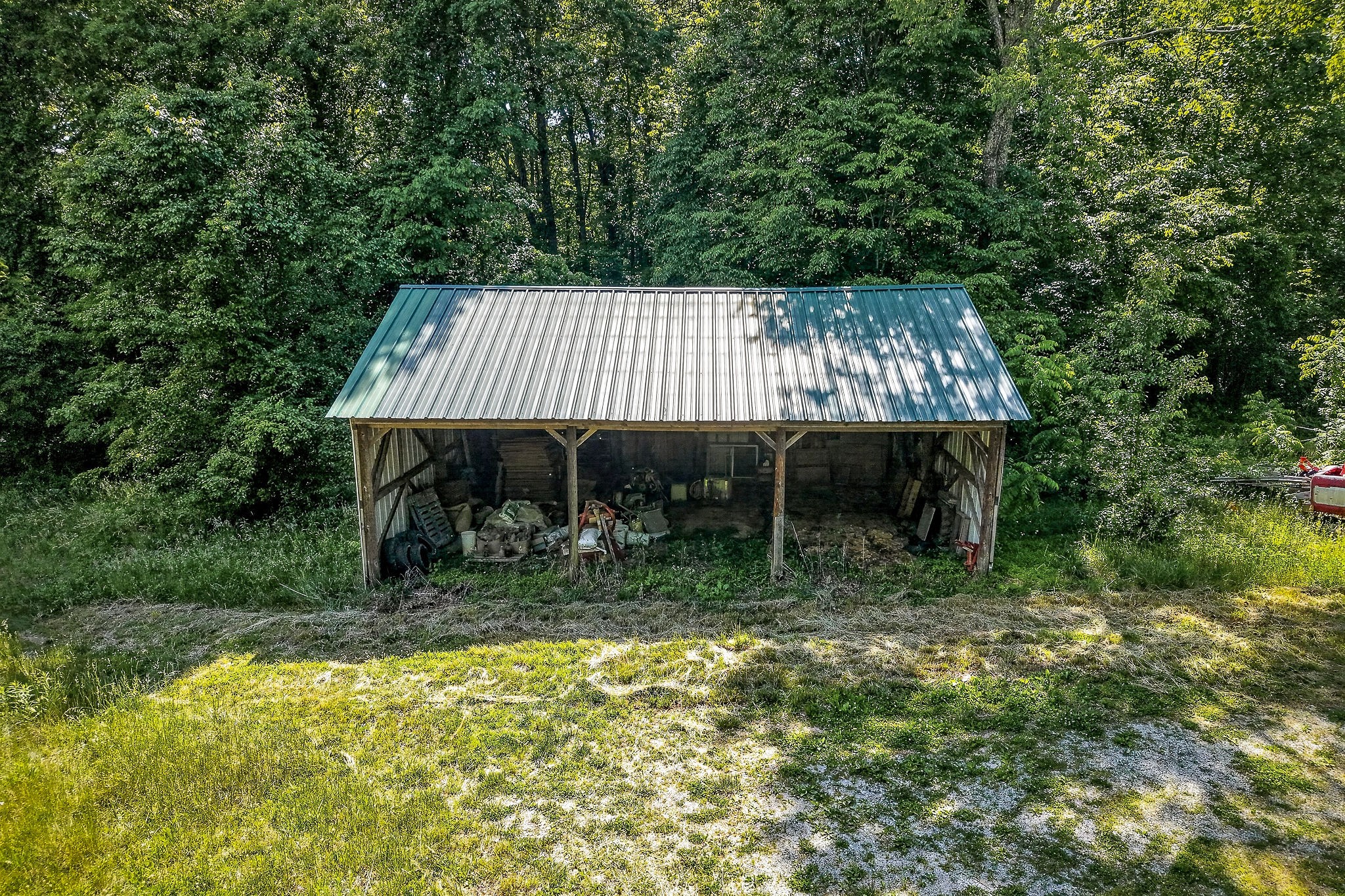 1720 Besstown Road Beersheba Springs, TN 37305 - Photo 12 of 75 a view of a backyard with a table and chairs
