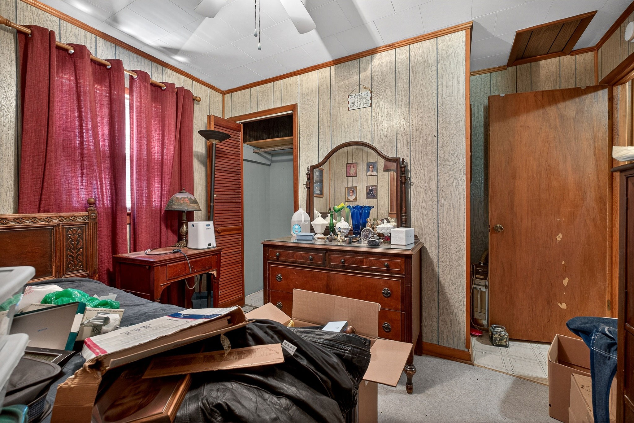 1720 Besstown Road Beersheba Springs, TN 37305 - Photo 26 of 75 a bedroom with a bed and a mirror