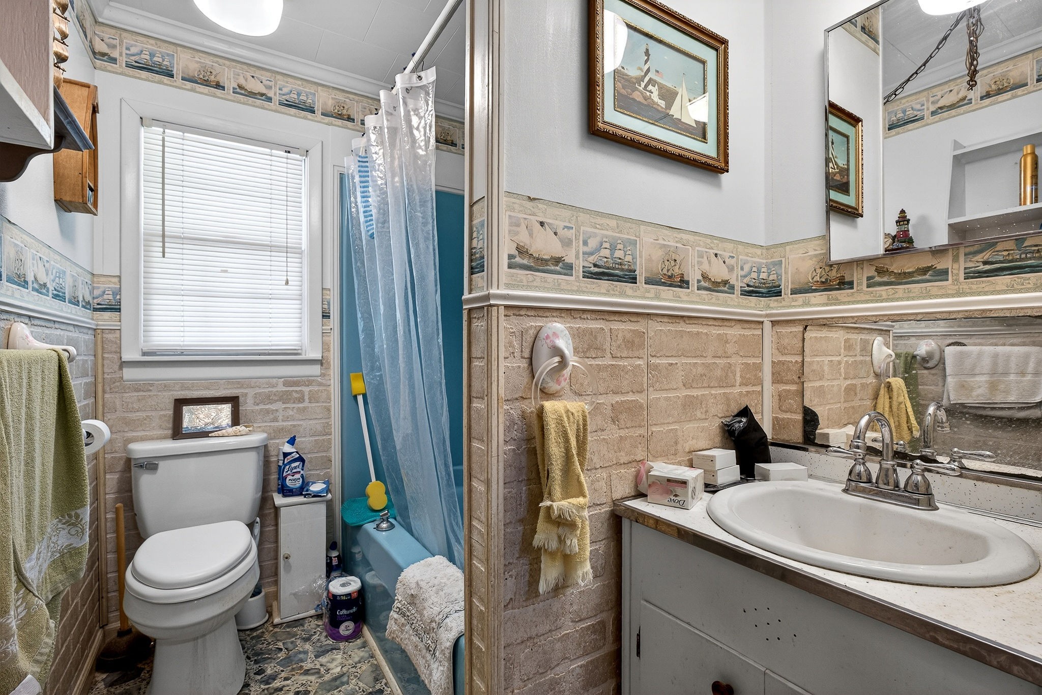 1720 Besstown Road Beersheba Springs, TN 37305 - Photo 27 of 75 a bathroom with a sink toilet and shower