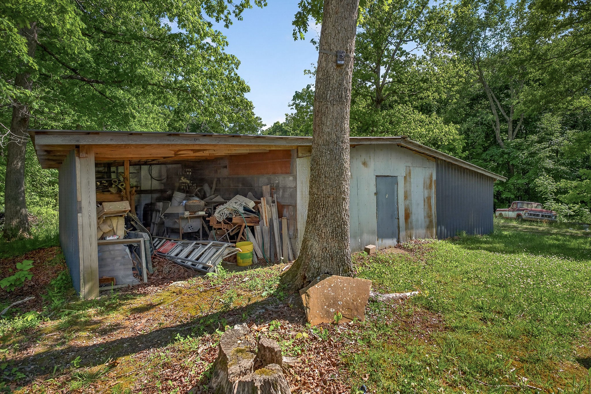 1720 Besstown Road Beersheba Springs, TN 37305 - Photo 44 of 75 a view of a chair and table in backyard of house