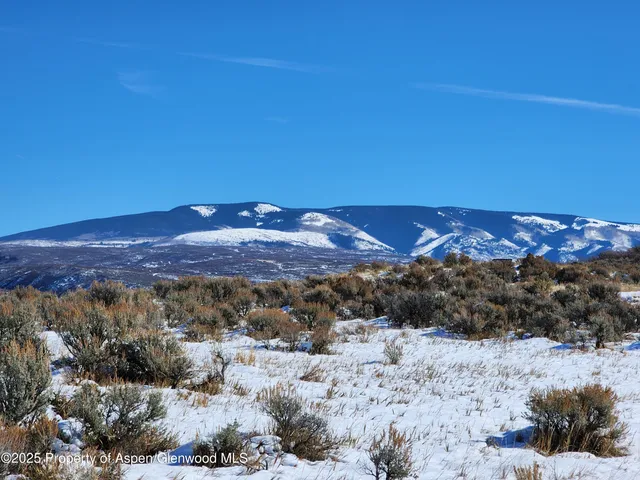 a view of a city and mountains