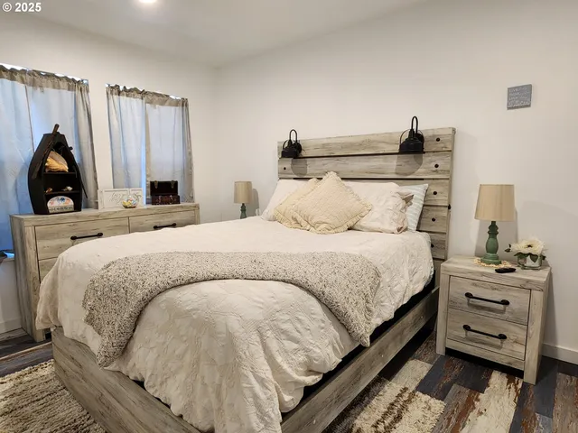 a bedroom with a bed and a walk in closet