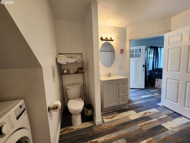 a bathroom with a toilet and a sink