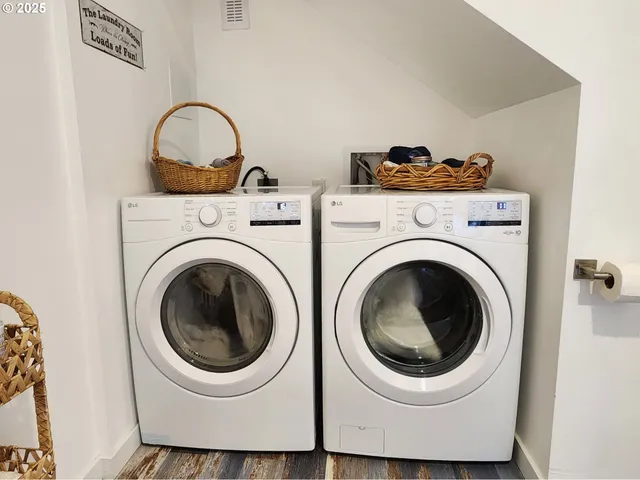 a utility room with dryer and washer