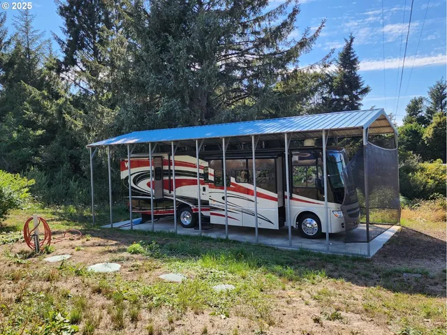 swimming pool view with a seating space