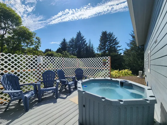 a terrace of a house with outdoor seating