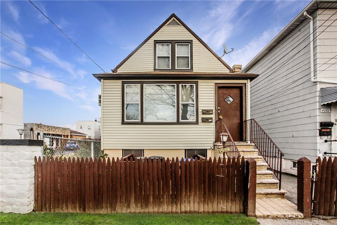 1534 Research Avenue Bronx, NY 10465 - Photo 1 of 21 a front view of a house with garden