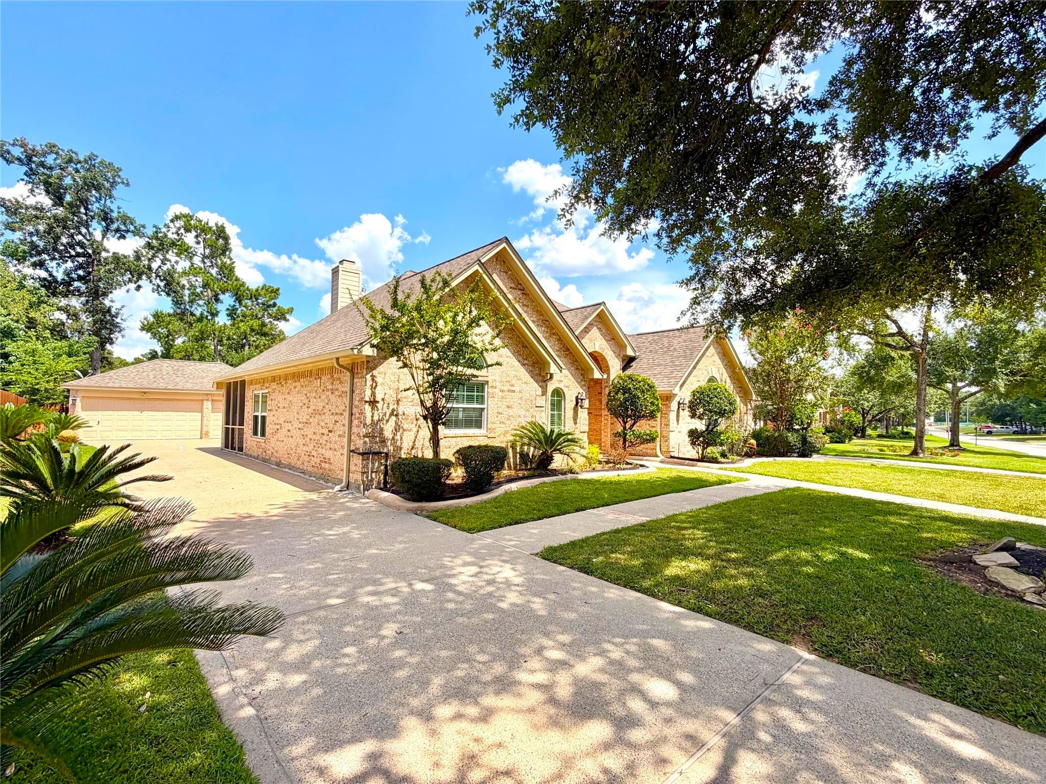 24818 Haverford Road Spring, TX 77389 - Photo 3 of 45 3 Car Detached Garage and long driveway provide plenty of parking and storage space.