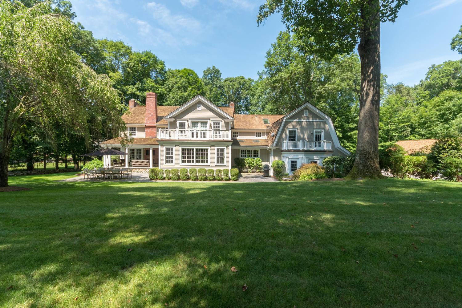 108 Inwood Road Darien, CT 06820 - Photo 60 of 83 a front view of a house with a yard