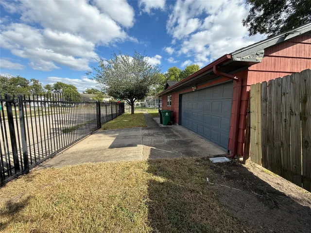 a view of backyard with green space