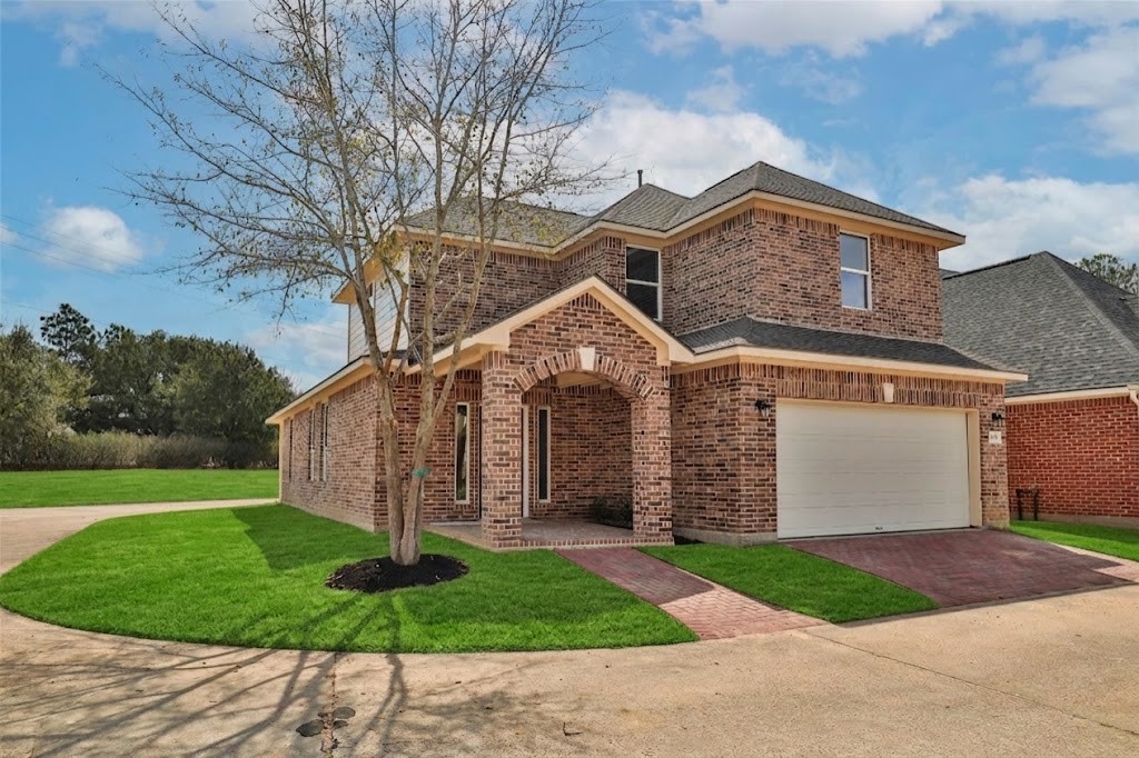 7655 Ameswood Road Houston, TX 77095 - Photo 2 of 31 Front Elevation from side.