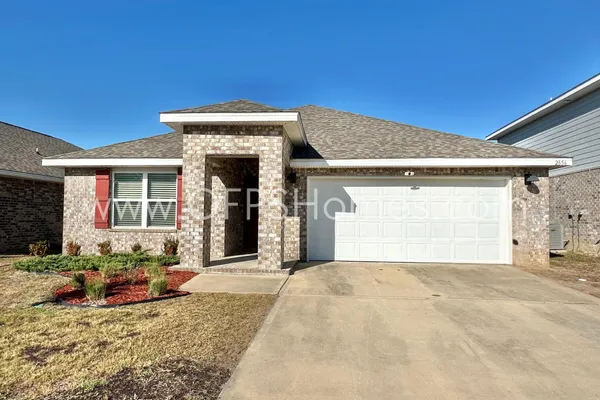 a view of a house with a patio