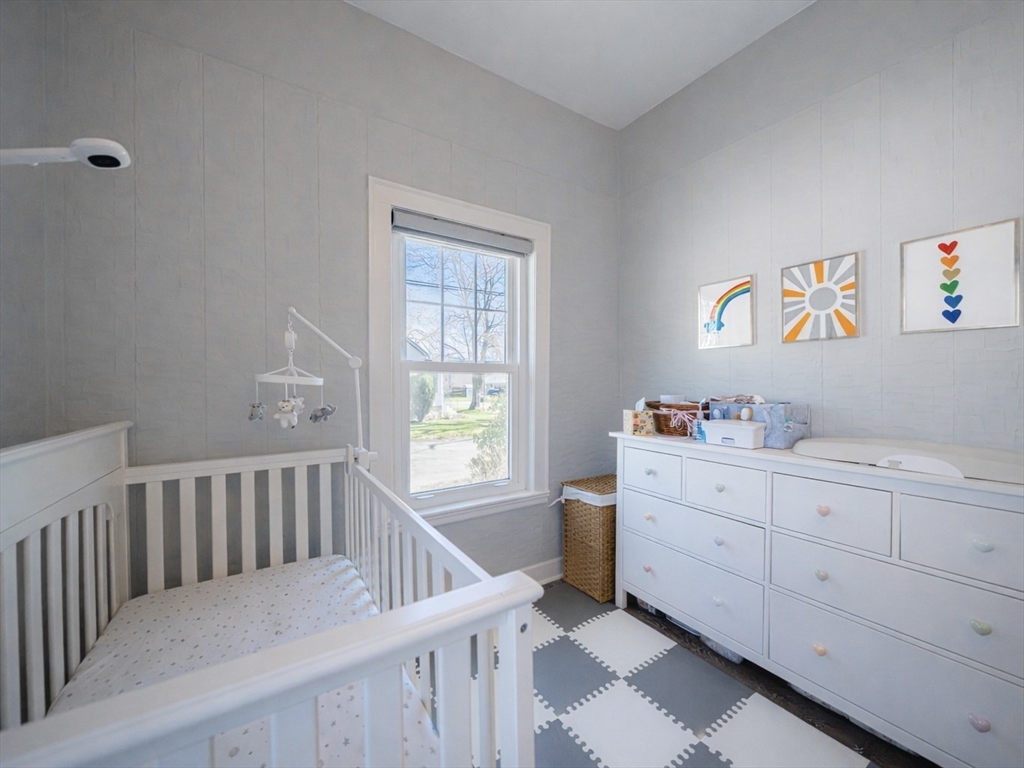 10 Guild Road Saugus, MA 01906 - Photo 22 of 32 a bedroom with furniture and a window