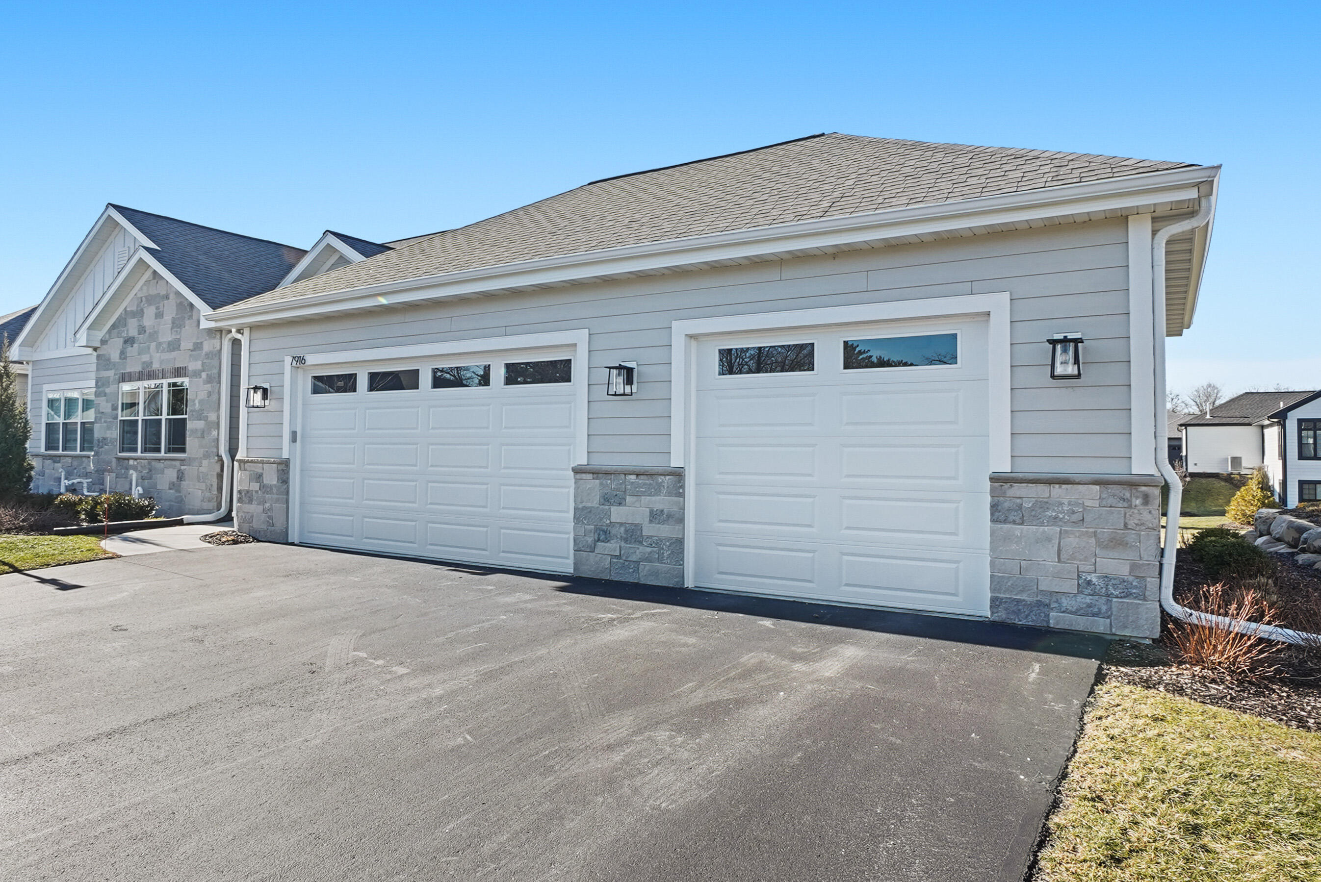 7916 East Stone Rdg Drive Lannon, WI 53046 - Photo 2 of 31 Garage Exterior