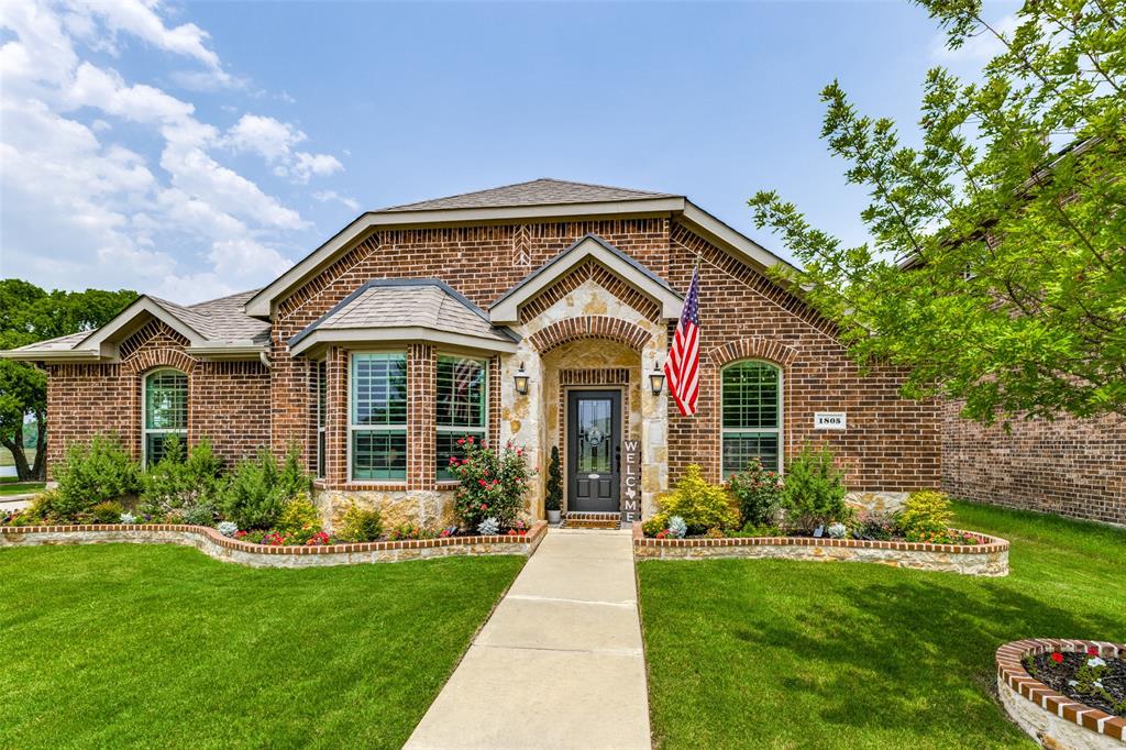 1805 Stetson Way Allen, TX 75002 - Photo 1 of 1 a front view of a house with a yard