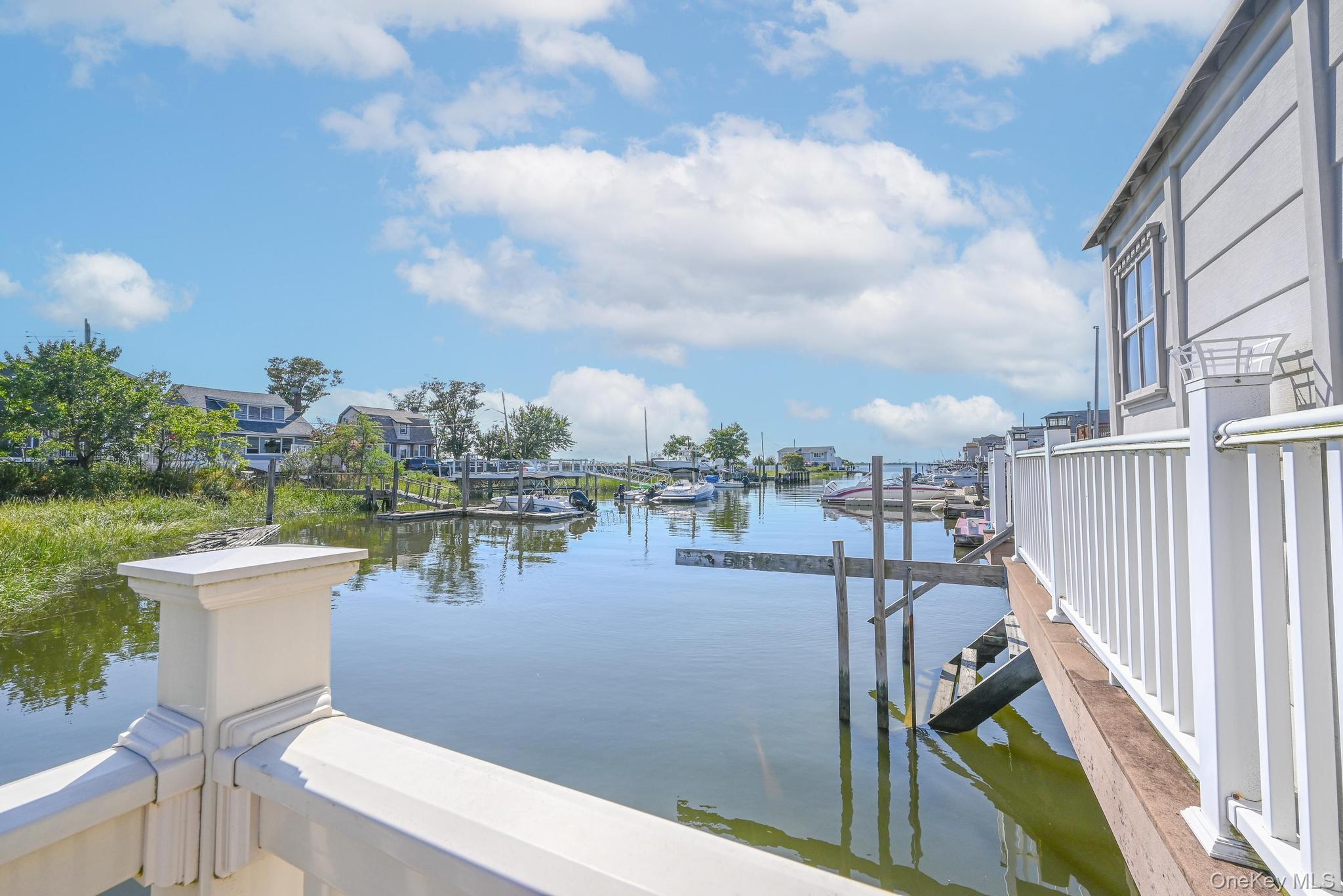 20 West 18th Road Queens, NY 11693 - Photo 11 of 41 a view of a lake and outdoor space