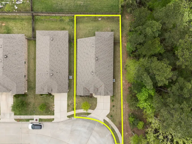 a view of swimming pool with outdoor seating and lake view