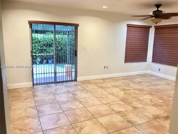 a view of an empty room and window