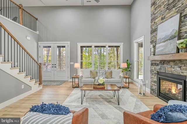 a view of a room with wooden floor