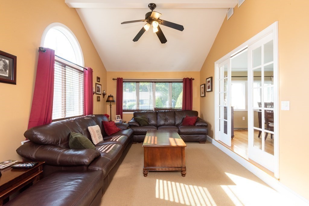 8 Pyburn Road Lynnfield, MA 01940 - Photo 11 of 35 a living room with furniture and a large window