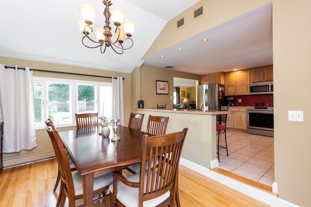 8 Pyburn Road Lynnfield, MA 01940 - Photo 13 of 35 a view of a dining room with furniture window and outside view