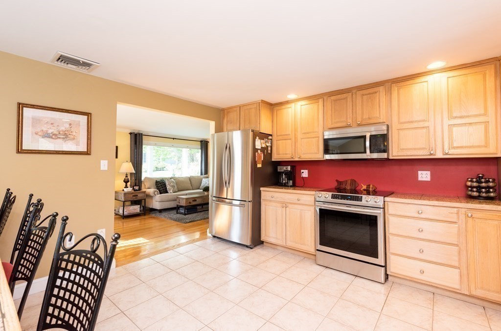 8 Pyburn Road Lynnfield, MA 01940 - Photo 18 of 35 a kitchen with refrigerator and cabinets