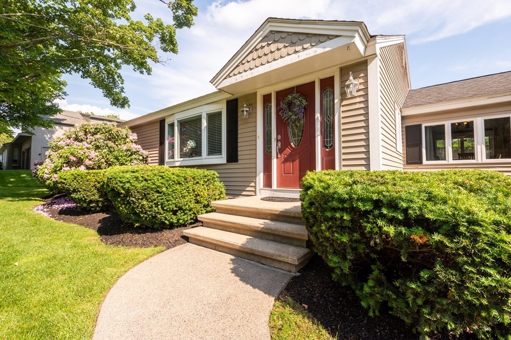 8 Pyburn Road Lynnfield, MA 01940 - Photo 2 of 35 a view of a house with potted plants