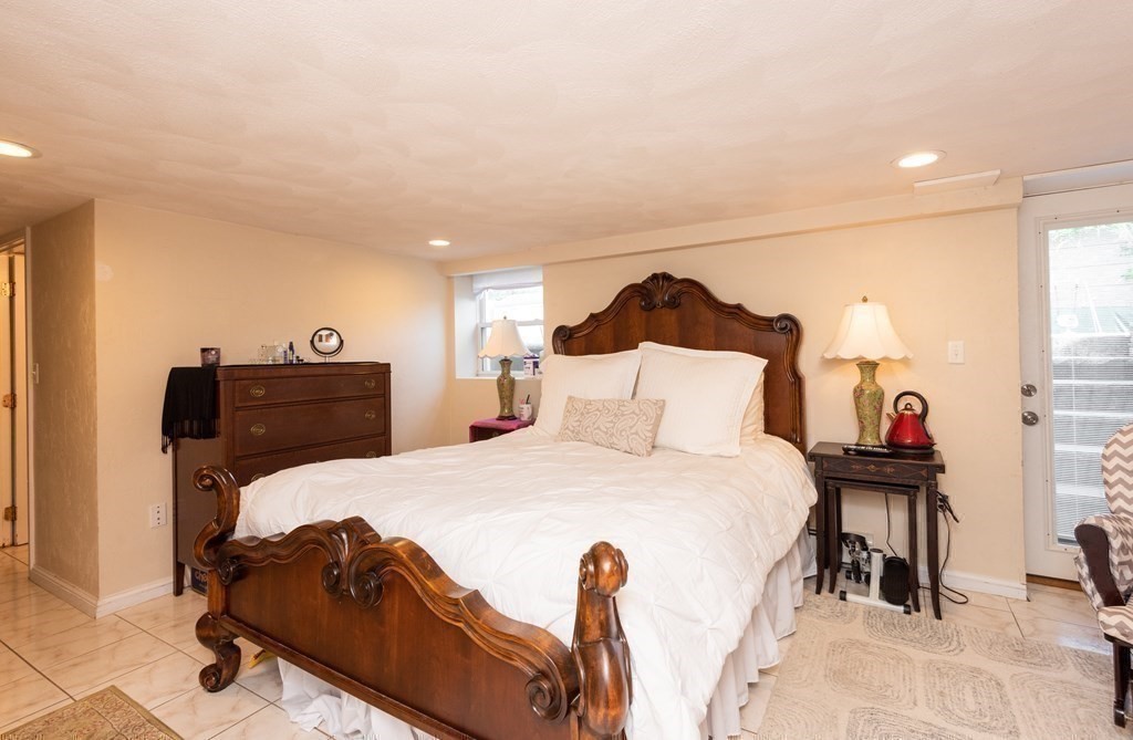 8 Pyburn Road Lynnfield, MA 01940 - Photo 23 of 35 a bedroom with a bed and a dresser