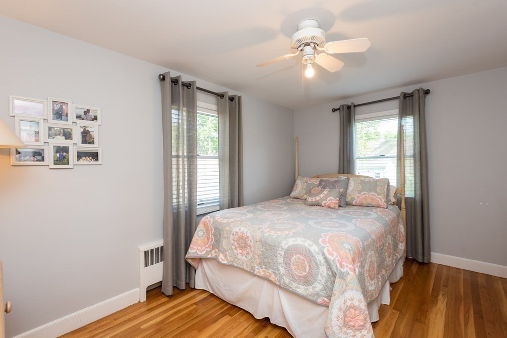 8 Pyburn Road Lynnfield, MA 01940 - Photo 24 of 35 a bedroom with a bed and a window