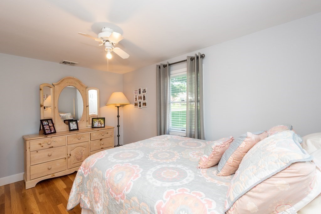 8 Pyburn Road Lynnfield, MA 01940 - Photo 26 of 35 a bedroom with a bed and a dresser