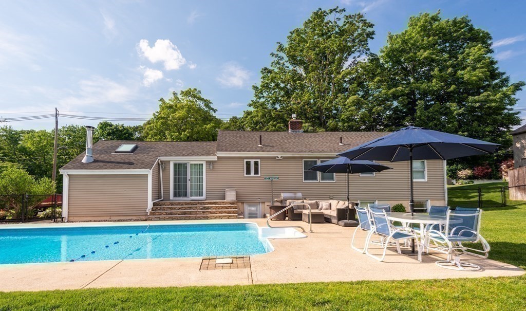 8 Pyburn Road Lynnfield, MA 01940 - Photo 29 of 35 a view of a house with backyard sitting area and garden