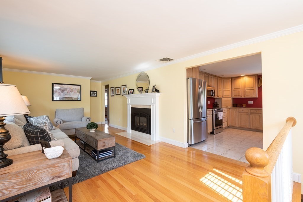 8 Pyburn Road Lynnfield, MA 01940 - Photo 6 of 35 a living room with furniture and a wooden floor