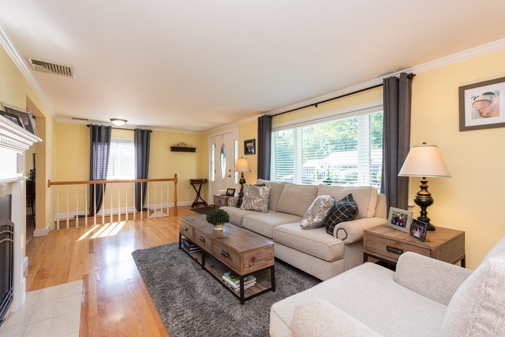 8 Pyburn Road Lynnfield, MA 01940 - Photo 7 of 35 a living room with furniture and a large window