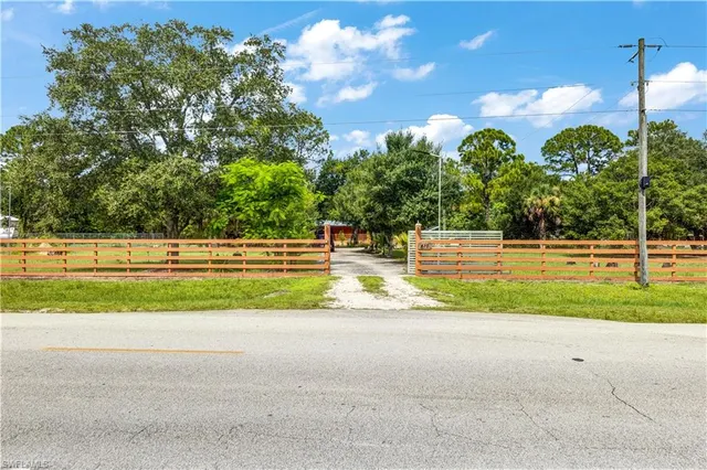 a view of yard with swimming pool and outdoor seating