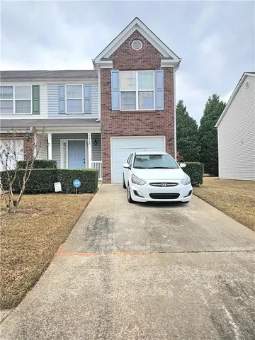 a car parked in front of a house
